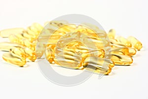 Yellow Liquid Filled Medication Capsules