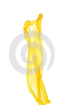 Yellow liquid flying explosion, pigment corn banana juice fresh float pour in mid air. Yellow paint color splash spill drop