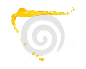 Yellow liquid flying explosion, pigment corn banana juice fresh float pour in mid air. Yellow paint color splash spill drop