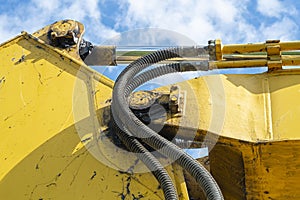 Yellow loaders connecting pipes