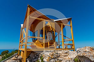 Yellow lookout tower at Montokuc hill at Mljet national park in Croatia