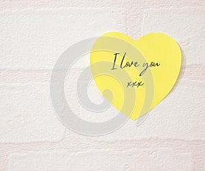 Yellow love heart post it note graphic with quote text - I love you