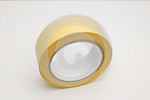 Yellow masking tape on a white background.