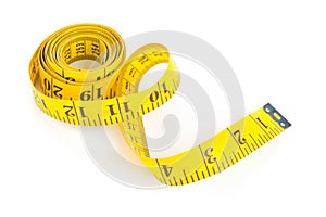 Yellow measure tape on white background