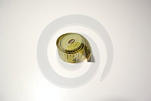 Yellow Measuring Tape on White Background, CM, Inches