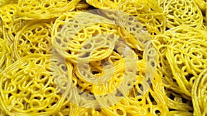 yellow mei crackers that are ready to be fried