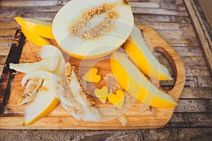 Yellow melon Cantaloupe slices with shape heart