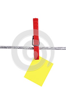 Yellow memo on clothesline