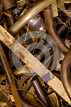 Yellow metal from brass. remnants of brass processing after punching. brass details close-up