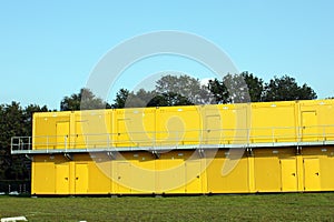 Yellow metal containers