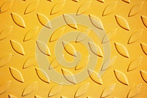 Yellow metal diamond plate pattern background.