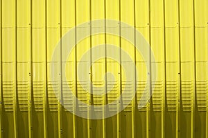 yellow metal sheet pattern and vertical line design photo