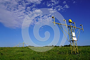 Yellow metal support systems of care during takeoff and landing - landing direction light near runway. air traffic safety