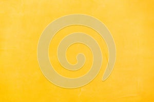 Yellow microcement texture background photo