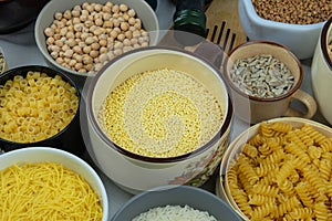 Yellow millet in bowl. Shopping and storage products. Vegetarian organic product.