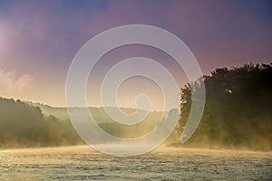 Misty sunrise over the river