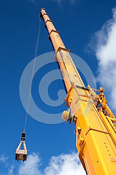 Yellow mobile crane boom