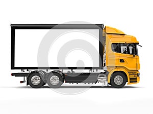 Yellow modern heavy transport truck - side view