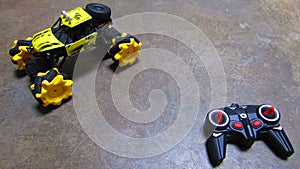 Yellow Monster Truck Remote Control with copy space area in center.