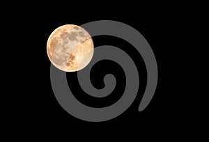 Yellow moon in the black sky