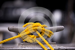 Yellow mooring rope on the hook