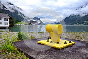 Yellow moring point and the Sky Princess in a misty Skjolden