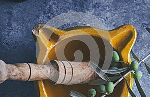 Yellow mortar to make a sauce called allioli, typical of Catalonia. Spain photo