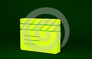 Yellow Movie clapper icon isolated on green background. Film clapper board. Clapperboard sign. Cinema production or