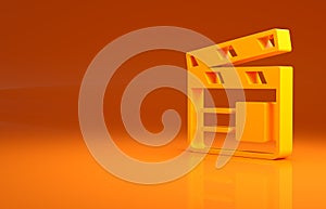 Yellow Movie clapper icon isolated on orange background. Film clapper board. Clapperboard sign. Cinema production or