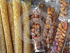 yellow mung beans and Roasted peanuts coated with sugar and sesame