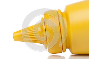 A yellow mustard bottle