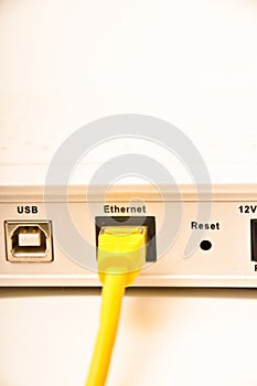 Yellow network cable cad5 and modem