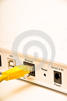 Yellow network cable cad5 and modem