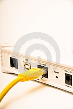 Yellow network cable cad5 and modem