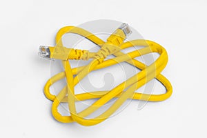 yellow network cable, isolated on white background. Closeup LAN cables with connector.