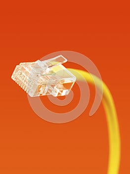 Yellow network cable plug close-up