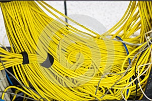 The yellow network cables in the server room for connecting to a network internet