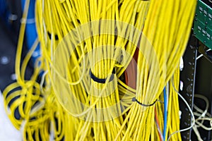 The yellow network cables in the server room for connecting to a network internet