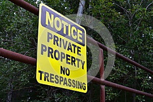 Yellow No Trespassing Sign