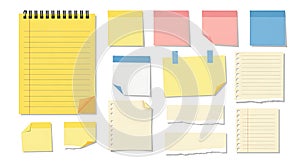 Yellow notebook and assorted colored sticky papers