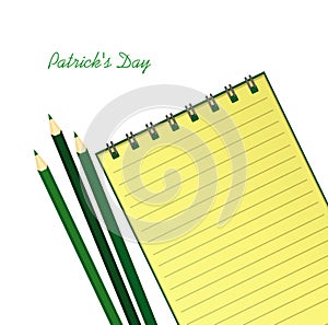 Yellow notebook with template hand-drawn Green festive bunting with clover and pencil. Irish holiday - Happy St. Patrick`s Day