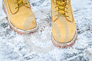 Yellow nubuck boots in the snow