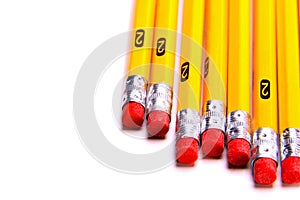 Yellow number 2 drawing pencils and erasers