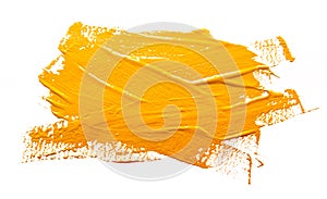 Yellow ochre strokes of the paint brush isolated