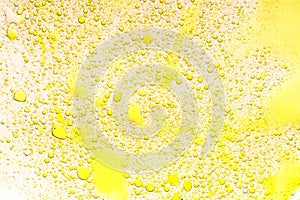 Yellow oil bubbles background