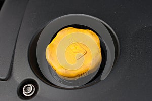 Yellow oil filler cap