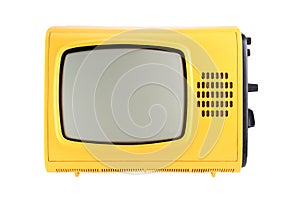 Yellow old vintage TV set isolated on white background. 1970s, 1980s, 1990s TV.