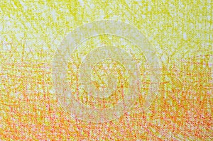 Yellow and orange crayon drawings on white background texture