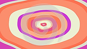 Yellow orange and purple stain turning round the middle point in slow hypnotic rhytm.  Bright colorful abstraction turning