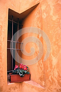 Yellow Orange Stucco Building Exterior with Flower Box Italy